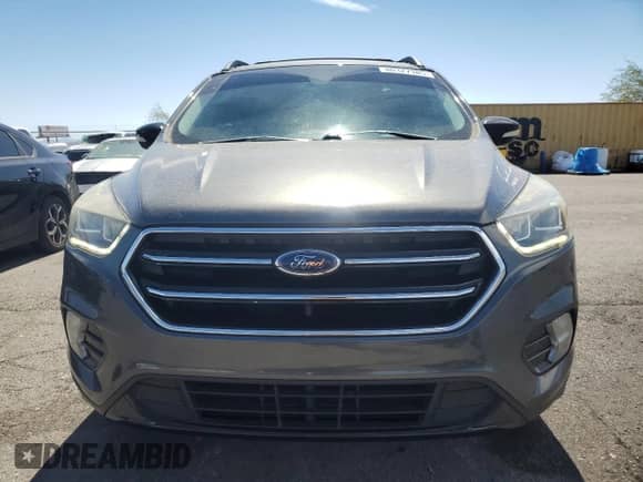 2017 Ford Escape Titanium with VIN 1FMCU9J98HUE57772, listed as a Copart auction lot 80327385 with 49,624 mi miles and Salvage title. Bid and sale history available at DreamBid. Image 5.