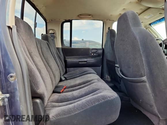 2002 Dodge Dakota Sport z VIN 1B7HL38N62S692851, wystawiony jako Copart lot #63767335 z przebiegiem 218 871 mil mil oraz Szkoda całkowita • Salvage title. Historia ofert i sprzedaży dostępna na DreamBid. Obrazek 10.