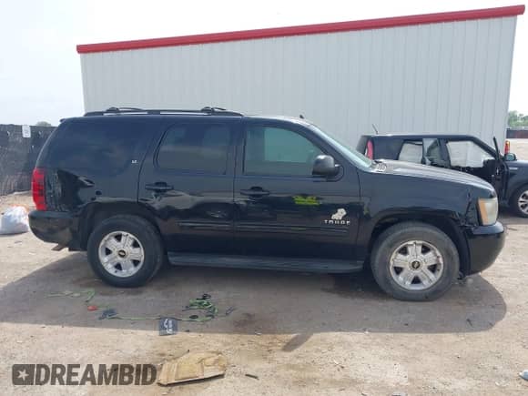 2009 Chevrolet Tahoe 2LT with VIN 1GNEC23319R299092, listed as a IAAI auction lot 42264628 with 194,186 mi miles and . Bid and sale history available at DreamBid. Image 6.