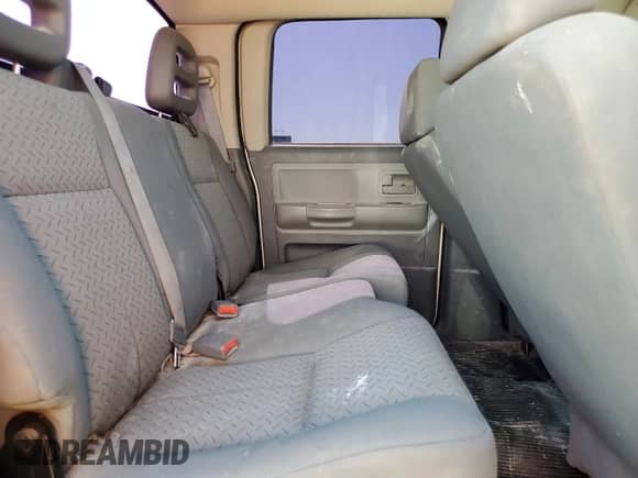 2007 Dodge Dakota z VIN 1D3HE28K57S191541, wystawiony jako Copart lot #73762424 z przebiegiem 184 274 mil mil oraz Szkoda całkowita • Salvage title. Historia ofert i sprzedaży dostępna na DreamBid. Obrazek 10.