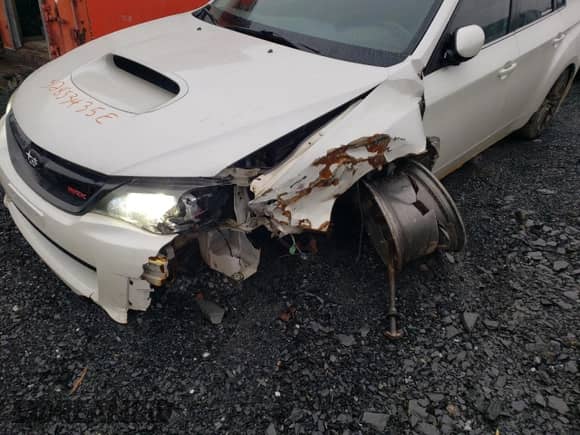 2012 Subaru WRX WRX Premium with VIN JF1GV7F64CG014358, listed as a Copart auction lot 52853435 with 208,501 mi miles and Salvage title. Bid and sale history available at DreamBid. Image 12.