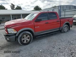 2010 Dodge 1500 TRX with VIN 1D7RB1CP2AS169044, listed as a Copart auction lot 63451085 with 114,926 mi miles and Salvage title. Bid and sale history available at DreamBid. Image 1.