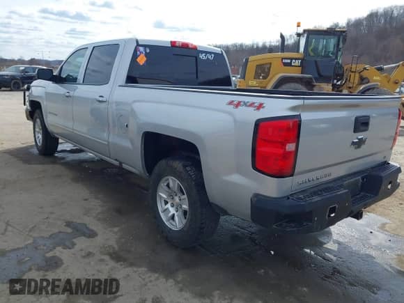 2016 Chevrolet Silverado 1500 LT with VIN 1GCUKREC9GF229979, listed as a IAAI auction lot 41859015 with 110,821 mi miles and . Bid and sale history available at DreamBid. Image 3.