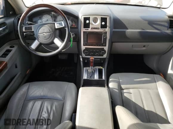 2007 Chrysler 300 C with VIN 2C3LA63H57H765570, listed as a Copart auction lot 65699425 with 180,116 mi miles and Salvage title. Bid and sale history available at DreamBid. Image 8.