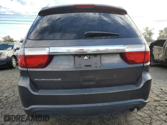 2013 Dodge Durango SXT with VIN 1C4RDHAG0DC694375, listed as a Copart auction lot 82360515 with 219,201 mi miles and Salvage title. Bid and sale history available at DreamBid. Image 6.