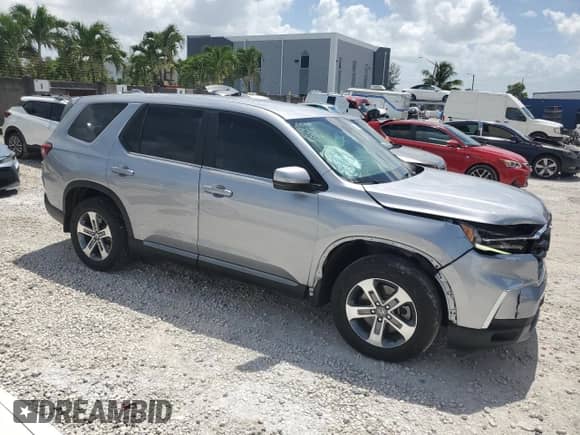 2023 Honda Pilot EX-L with VIN 5FNYG2H53PB001889, listed as a Copart auction lot 64753415 with 17,669 mi miles and Salvage title. Bid and sale history available at DreamBid. Image 4.