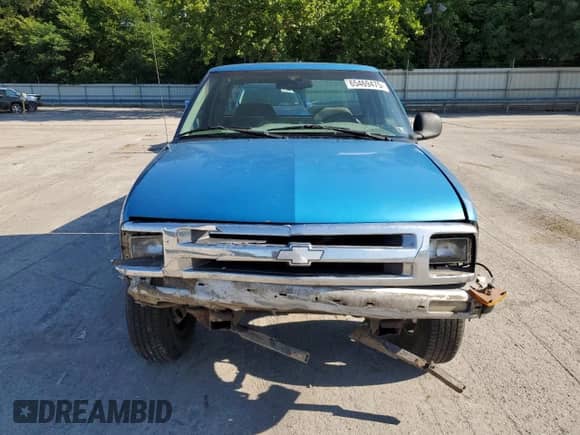 1995 Chevrolet S-10 LS с VIN 1GCCS1948S8254384, выставлен на аукционе Copart как лот 65469475 с пробегом 205 348 миль миль и Списание • Salvage title. История ставок и продаж доступна на DreamBid. Изображение 5.