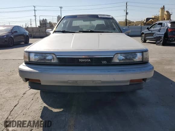 1990 Toyota Camry with VIN JT2VV22E3L3003353, listed as a Copart auction lot 68489125 with 131,662 mi miles and Clean title. Bid and sale history available at DreamBid. Image 5.