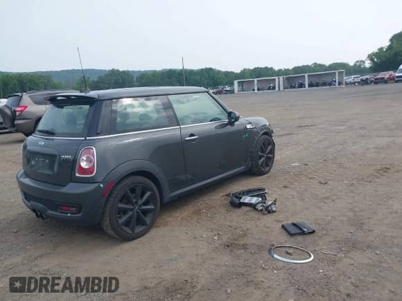 2011 MINI Hardtop S with VIN WMWSV3C58BTY13412, listed as a IAAI auction lot 42516587 with 124,831 mi miles and . Bid and sale history available at DreamBid. Image 4.