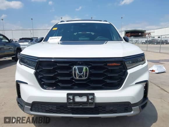 2023 Honda Pilot TrailSport with VIN 5FNYG1H67PB043095, listed as a IAAI auction lot 42045974 with 46,333 mi miles and . Bid and sale history available at DreamBid. Image 12.