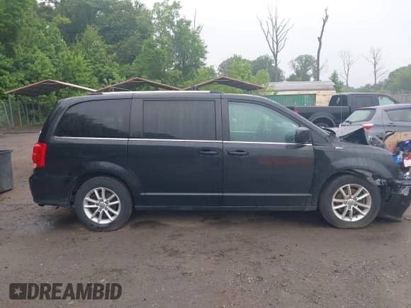 2018 Dodge Grand Caravan SXT with VIN 2C4RDGCG0JR281480, listed as a IAAI auction lot 42448252 with 142,393 mi miles and . Bid and sale history available at DreamBid. Image 13.