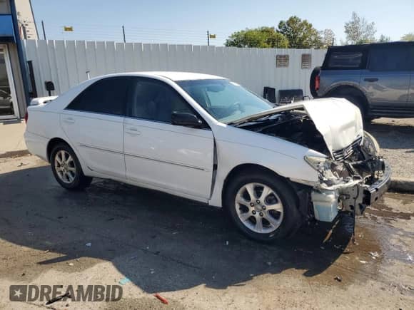 2005 Toyota Camry LE with VIN 4T1BE32K45U405719, listed as a Copart auction lot 84705675 with 200,560 mi miles and Non repairable. Bid and sale history available at DreamBid. Image 4.