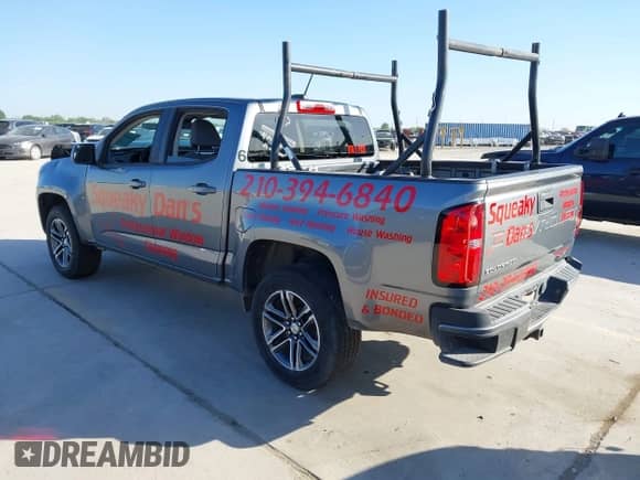 2021 Chevrolet Colorado 2WD Work Truck z VIN 1GCGSBEA4M1109275, wystawiony jako IAAI lot #41881866 z przebiegiem 62 077 mil mil oraz . Historia ofert i sprzedaży dostępna na DreamBid. Obrazek 3.