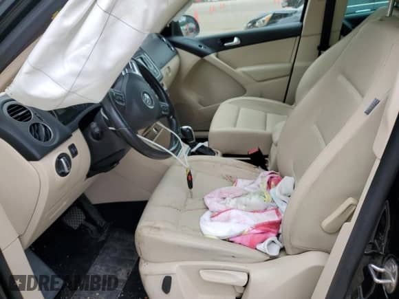 2013 Volkswagen Tiguan SE с VIN WVGAV7AXXDW523728, выставлен на аукционе Copart как лот 64116173 с пробегом 116 336 миль миль и Списание • Salvage title. История ставок и продаж доступна на DreamBid. Изображение 7.