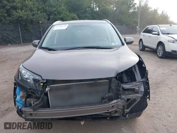 2014 Honda CR-V EX-L с VIN 2HKRM4H75EH634855, выставлен на аукционе IAAI как лот 43290724 с пробегом 54 502 миль миль и . История ставок и продаж доступна на DreamBid. Изображение 13.