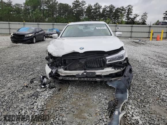 2018 BMW 7 Series 750i с VIN WBA7F0C53JGM22614, выставлен на аукционе Copart как лот 51787515 с пробегом Не указан миль и Списание • Salvage title. История ставок и продаж доступна на DreamBid. Изображение 5.