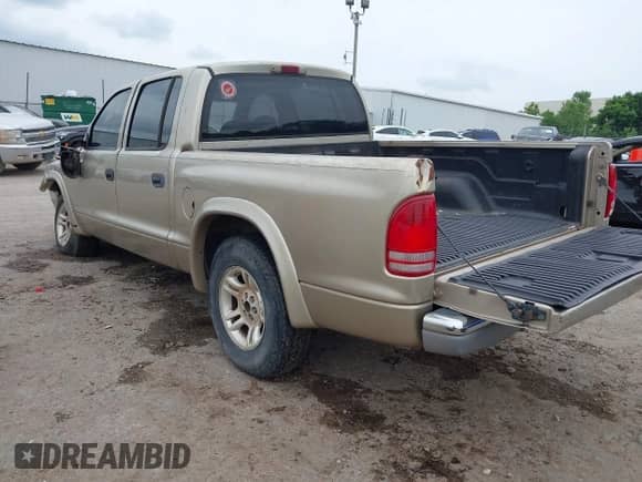 2004 Dodge Dakota SLT с VIN 1D7HL48N84S619527, выставлен на аукционе IAAI как лот 42484398 с пробегом 275 998 миль миль и . История ставок и продаж доступна на DreamBid. Изображение 3.