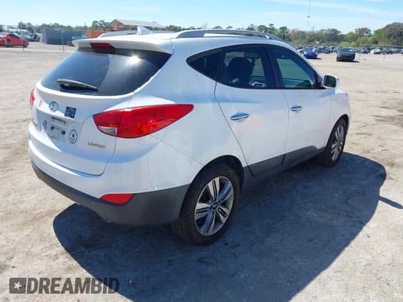 2014 Hyundai Tucson SE with VIN KM8JU3AG8EU829819, listed as a IAAI auction lot 41702183 with 90,791 mi miles and . Bid and sale history available at DreamBid. Image 4.