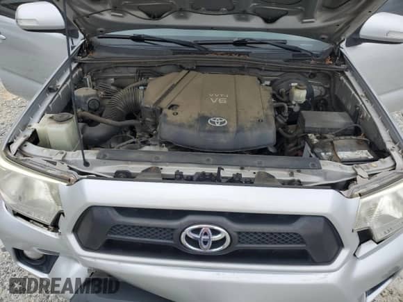 2013 Toyota Tacoma with VIN 3TMMU4FN6DM050274, listed as a Copart auction lot 84457385 with 171,272 mi miles and Salvage title. Bid and sale history available at DreamBid. Image 11.
