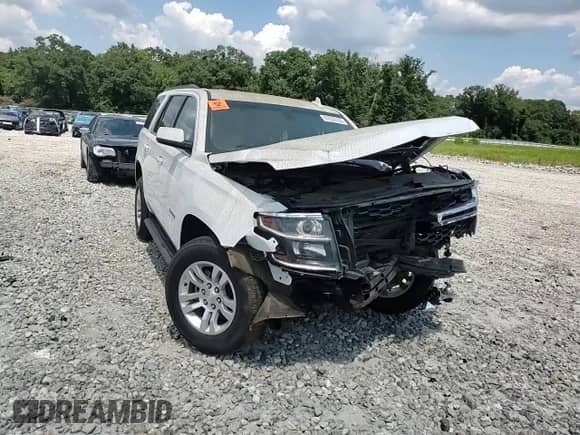 2018 Chevrolet Tahoe LS z VIN 1GNSCAKC6JR149000, wystawiony jako Copart lot #67835195 z przebiegiem 139 153 mil mil oraz Szkoda całkowita • Salvage title. Historia ofert i sprzedaży dostępna na DreamBid. Obrazek 14.