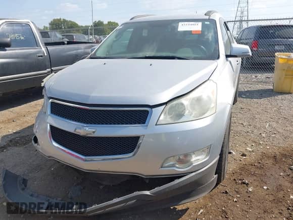 2009 Chevrolet Traverse 1LT z VIN 1GNEV23D19S135613, wystawiony jako IAAI lot #43244861 z przebiegiem 227 809 mil mil oraz . Historia ofert i sprzedaży dostępna na DreamBid. Obrazek 12.
