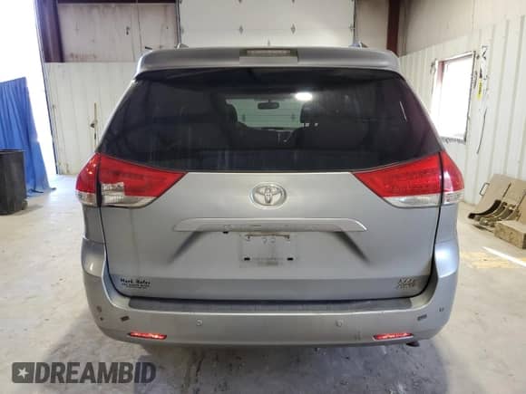 2011 Toyota Sienna XLE with VIN 5TDDK3DC2BS013933, listed as a Copart auction lot 86984825 with 194,951 mi miles and Clean title. Bid and sale history available at DreamBid. Image 6.