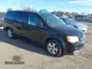 2013 Dodge Grand Caravan SE with VIN 2C4RDGBG9DR715580, listed as a IAAI auction lot 43457075 with 199,606 mi miles and . Bid and sale history available at DreamBid. Image 1.