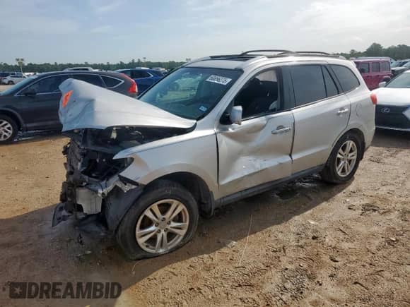 2012 Hyundai Santa Fe Limited с VIN 5XYZK4AG6CG158412, выставлен на аукционе Copart как лот 60856275 с пробегом 85 394 миль миль и Списание • Salvage title. История ставок и продаж доступна на DreamBid. Изображение 1.