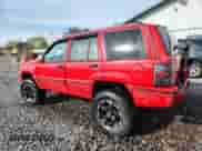 1994 Jeep Grand Cherokee Limited z VIN 1J4GZ78Y7RC139748, wystawiony jako Copart lot #82088745 z przebiegiem 240 948 mil mil oraz Szkoda całkowita • Salvage title. Historia ofert i sprzedaży dostępna na DreamBid. Obrazek 2.