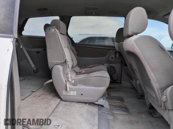 2007 Toyota Sienna CE с VIN 5TDZK23C67S052422, выставлен на аукционе Copart как лот 66112395 с пробегом 200 189 миль миль и Списание • Salvage title. История ставок и продаж доступна на DreamBid. Изображение 10.