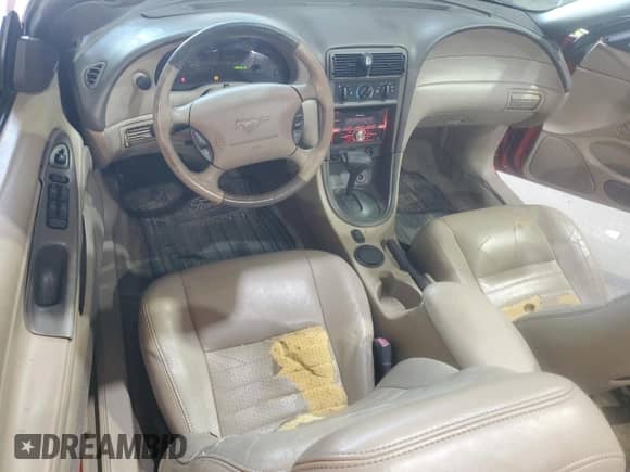 2002 Ford Mustang GT Deluxe z VIN 1FAFP45X22F169719, wystawiony jako Copart lot #67353635 z przebiegiem 138 581 mil mil oraz Szkoda całkowita • Salvage title. Historia ofert i sprzedaży dostępna na DreamBid. Obrazek 8.