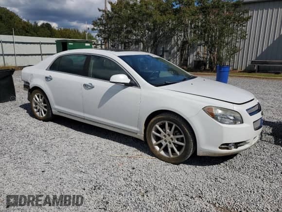2012 Chevrolet Malibu LTZ with VIN 1G1ZG5E73CF131472, listed as a Copart auction lot 85356735 with 142,889 mi miles and Salvage title. Bid and sale history available at DreamBid. Image 4.