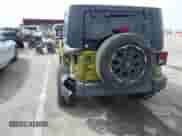 2007 Jeep Wrangler Unlimited Sahara z VIN 1J8GA59167L161894, wystawiony jako IAAI lot #41856064 z przebiegiem 122 714 mil mil oraz . Historia ofert i sprzedaży dostępna na DreamBid. Obrazek 6.