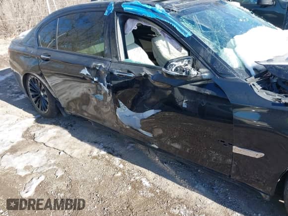 2013 BMW 7 Series 740Li xDrive with VIN WBAYF4C51DD127691, listed as a IAAI auction lot 41423840 with 90,916 mi miles and . Bid and sale history available at DreamBid. Image 16.