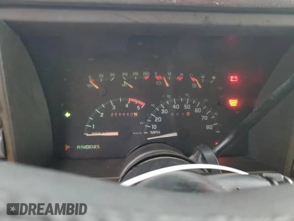 1993 Chevrolet Suburban z VIN 1GNEC16K5PJ308997, wystawiony jako Copart lot #68327744 z przebiegiem 256 660 mil mil oraz Szkoda całkowita • Salvage title. Historia ofert i sprzedaży dostępna na DreamBid. Obrazek 9.