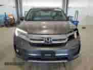 2021 Honda Pilot Touring 8-Passenger с VIN 5FNYF6H94MB034098, выставлен на аукционе Copart как лот 87397795 с пробегом 72 448 миль миль и Списание • Salvage title. История ставок и продаж доступна на DreamBid. Изображение 5.