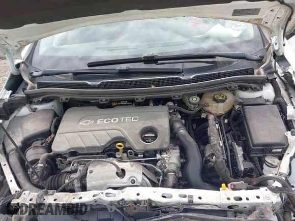 2018 Chevrolet Cruze LT z VIN 1G1BH5SE7J7151233, wystawiony jako IAAI lot #43190642 z przebiegiem 95 275 mil mil oraz . Historia ofert i sprzedaży dostępna na DreamBid. Obrazek 10.