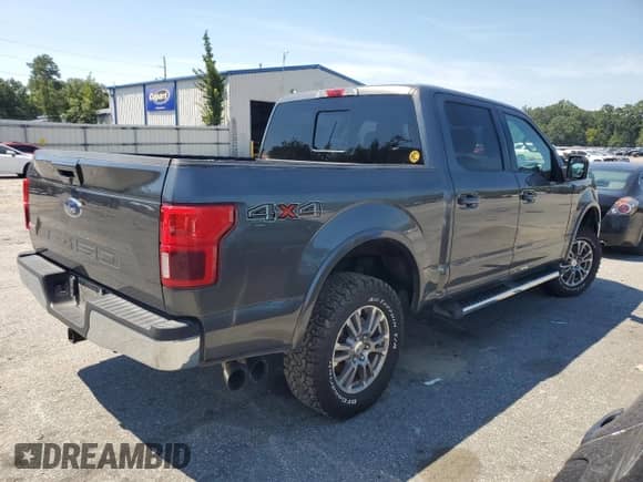 2020 Ford F-150 XLT с VIN 1FTEW1E53LFA64016, выставлен на аукционе Copart как лот 69876945 с пробегом 113 846 миль миль и Списание • Salvage title. История ставок и продаж доступна на DreamBid. Изображение 3.