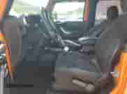 2013 Jeep Wrangler Rubicon 10th Anniversary with VIN 1C4BJWCG0DL526182, listed as a Copart auction lot 64806935 with 25,007 mi miles and Clean title. Bid and sale history available at DreamBid. Image 7.