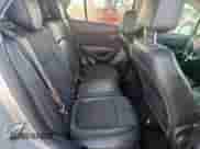 2019 Chevrolet Trax LT z VIN KL7CJLSB2KB811796, wystawiony jako Copart lot #69226525 z przebiegiem 76 131 mil mil oraz Szkoda całkowita • Salvage title. Historia ofert i sprzedaży dostępna na DreamBid. Obrazek 11.