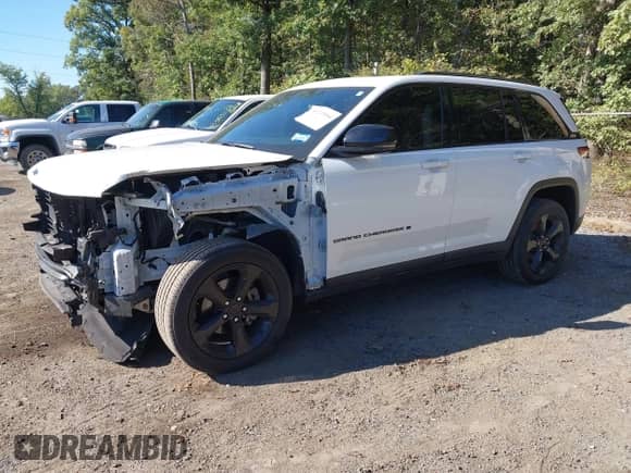 2023 Jeep Grand Cherokee Laredo with VIN 1C4RJHAG4PC513470, listed as a IAAI auction lot 43297054 with 37,533 mi miles and . Bid and sale history available at DreamBid. Image 2.