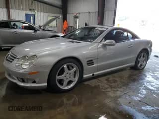 2003 Mercedes-Benz SL 55/63 AMG with VIN WDBSK74FX3F049216, listed as a Copart auction lot 59734325 with 129,659 mi miles and Salvage title. Bid and sale history available at DreamBid. Image 1.