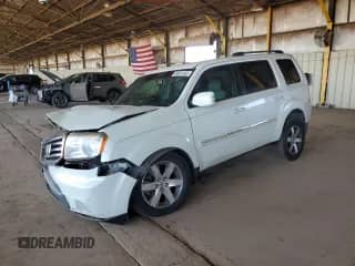 2012 Honda Pilot Touring with VIN 5FNYF3H9XCB009445, listed as a Copart auction lot 89931485 with 125,282 mi miles and Salvage title. Bid and sale history available at DreamBid. Image 1.