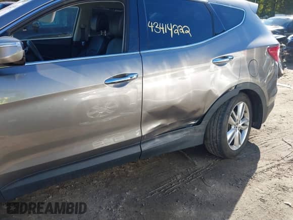 2014 Hyundai Santa Fe с VIN 5XYZUDLA7EG208966, выставлен на аукционе IAAI как лот 43414222 с пробегом 98 748 миль миль и . История ставок и продаж доступна на DreamBid. Изображение 6.