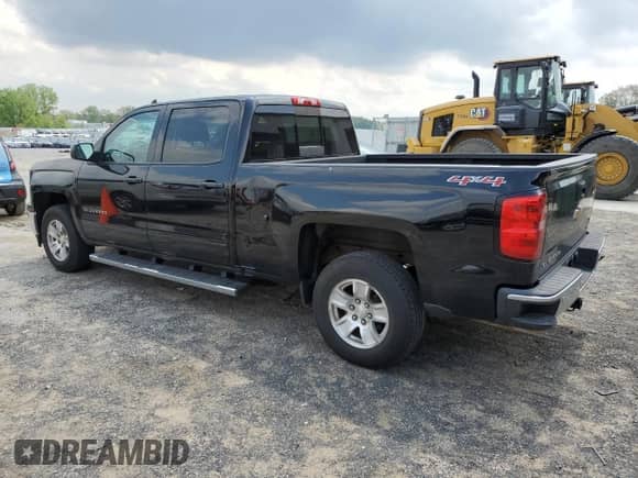 2015 Chevrolet Silverado 1500 LT with VIN 3GCUKREHXFG290086, listed as a Copart auction lot 56853315 with 127,294 mi miles and Clean title. Bid and sale history available at DreamBid. Image 2.