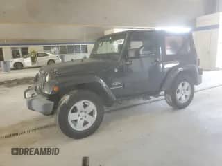 2010 Jeep Wrangler Sahara с VIN 1J4AA5D15AL125149, выставлен на аукционе Copart как лот 71431855 с пробегом 88 501 миль миль и Списание • Salvage title. История ставок и продаж доступна на DreamBid. Изображение 1.