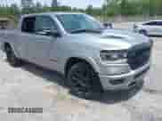 2021 Ram 1500 Laramie with VIN 1C6SRFJT1MN525708, listed as a IAAI auction lot 42181995 with Not provided miles and . Bid and sale history available at DreamBid. Image 1.