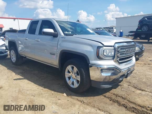 2016 GMC Sierra 1500 SLE with VIN 1GTV2MEC0GZ152957, listed as a IAAI auction lot 42850174 with 122,974 mi miles and . Bid and sale history available at DreamBid. Image 1.
