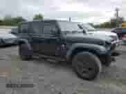 2022 Jeep Wrangler Unlimited Sport S with VIN 1C4HJXDG2NW165648, listed as a Copart auction lot 80365705 with 39,990 mi miles and Salvage title. Bid and sale history available at DreamBid. Image 4.