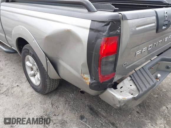 2003 Nissan Frontier XE z VIN 1N6DD26T93C408967, wystawiony jako IAAI lot #41496701 z przebiegiem 181 111 mil mil oraz . Historia ofert i sprzedaży dostępna na DreamBid. Obrazek 6.